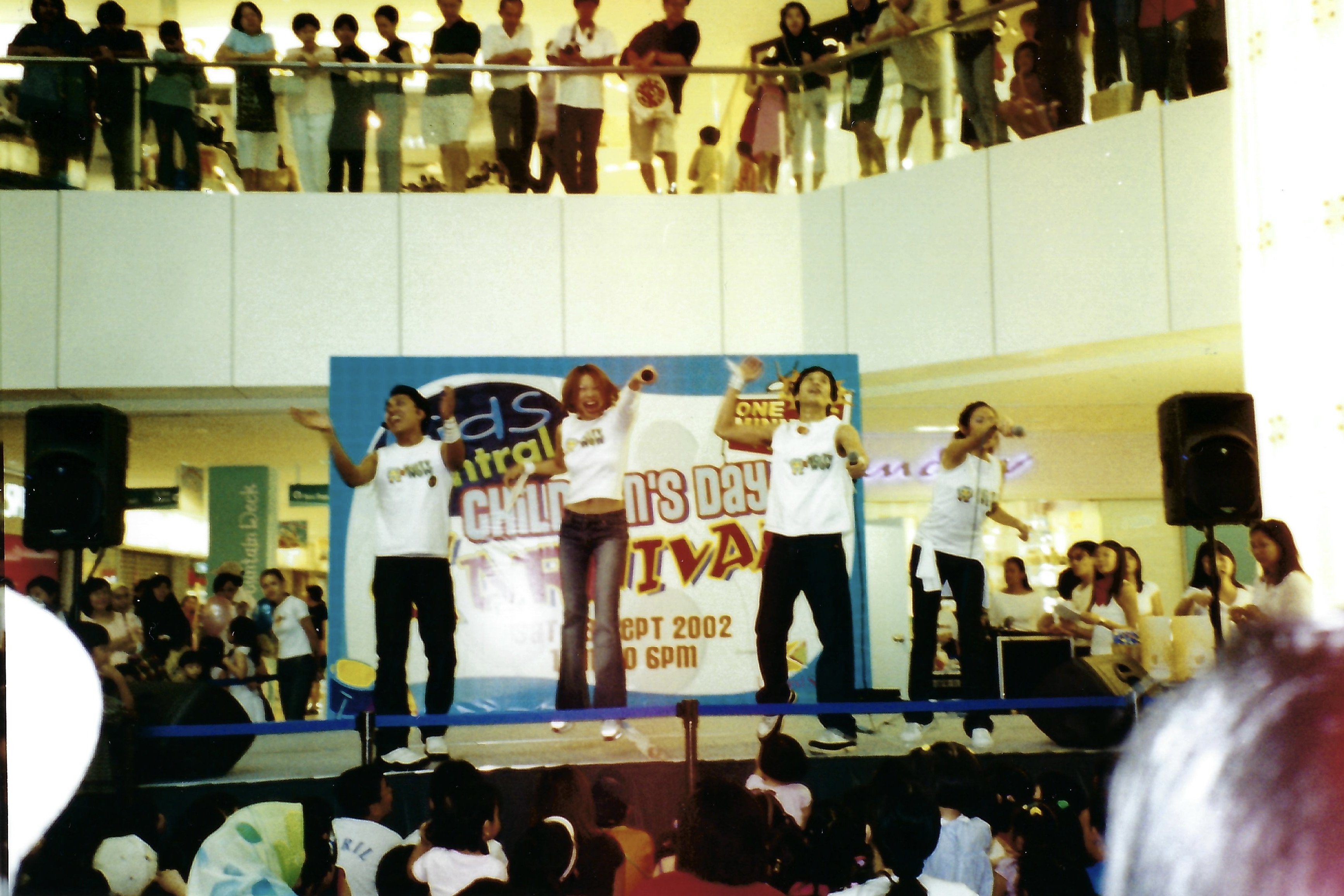 Singers performing live in a mall