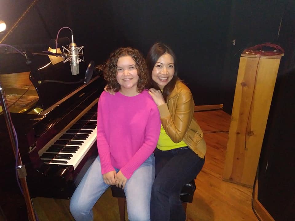 Sophia in recording studio with student