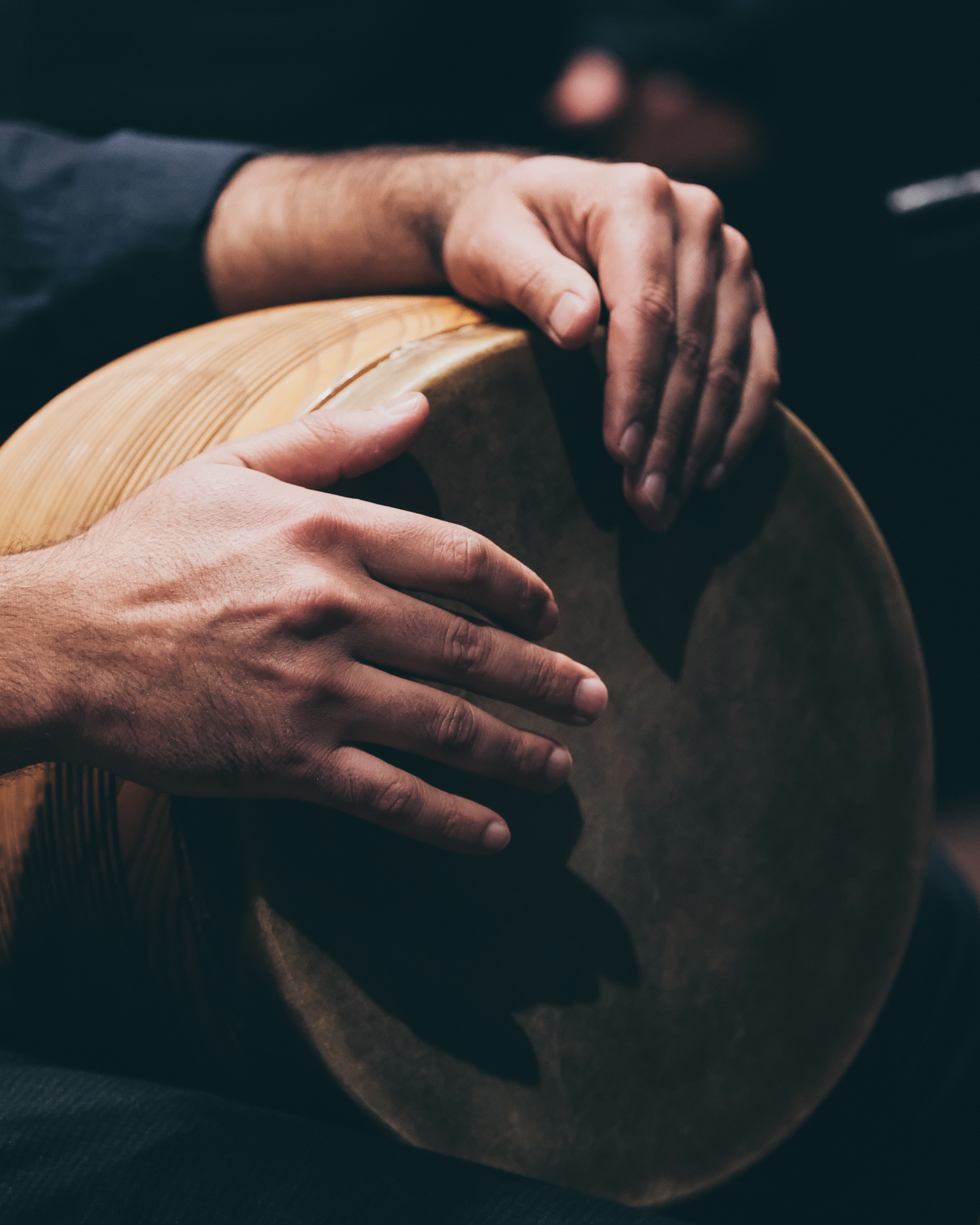 Hands on wood hand drum